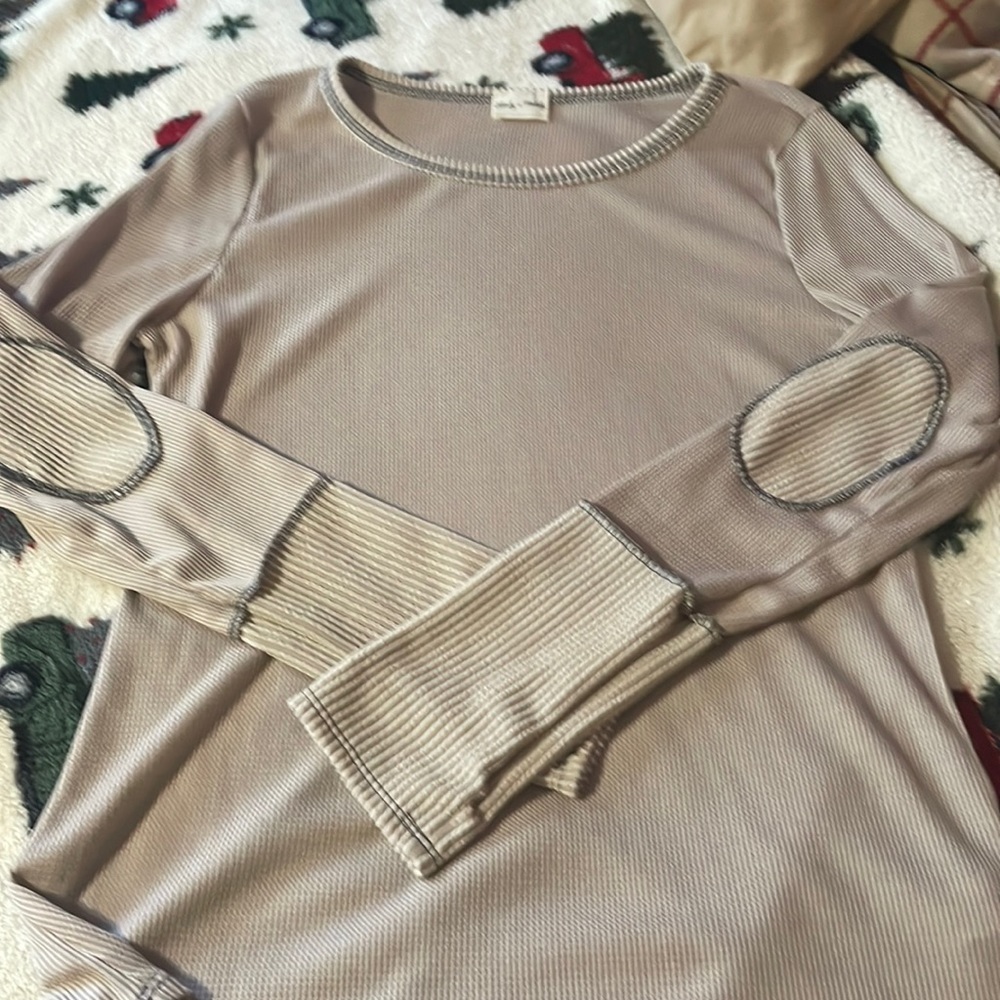 Woman’s long sleeve top